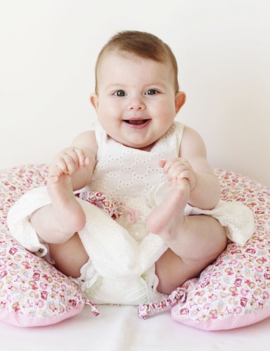 Feita em algodão e lavável, porque a maternidade real precisa de praticidade.